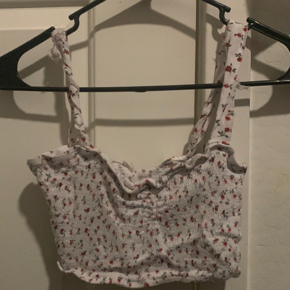 Shein cropped rose shirt. Stretchy. The size is a small.